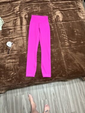 Woman’s size 0 Lululemon High-Rise Pink Leggings